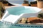 Mini piscine balnéothérapie coque polyester avec pompes et jets balnéo
