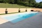 Piscine coque polyester Paques + plage en 13,5m avec volet immergé